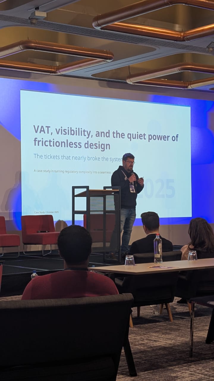 Michael Lockett speaking on stage at EventsAir Airtime 2025